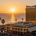 California casino at sunset with ocean view.