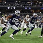 Cowboys vs. Raiders football game action