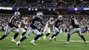 Cowboys vs. Raiders football game action