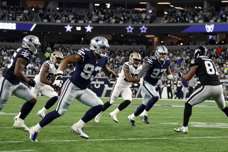 Cowboys vs. Raiders football game action